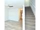 Living room with wood-look floors and staircase at 1910 Tropicana Rd # 9-B, North Charleston, SC 29406