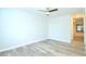 Bright bedroom with ceiling fan and wood-look floors at 1910 Tropicana Rd # 9-B, North Charleston, SC 29406