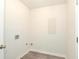 Clean laundry room with vinyl flooring and utility hookups at 1910 Tropicana Rd # 9-B, North Charleston, SC 29406