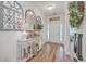 Bright and airy entryway with decorative mirrors and a console table at 612 S Pointe Blvd, Summerville, SC 29483