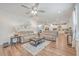 Open living room with a view of kitchen and vaulted ceiling at 612 S Pointe Blvd, Summerville, SC 29483