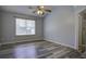 Spacious bedroom with hardwood floors and a large window at 115 Cairnwell Pass, Goose Creek, SC 29445