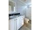 Clean bathroom with granite countertop and white cabinetry at 120 T Myers Dr, Saint Stephen, SC 29479