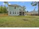 Large backyard with screened porch and partially fenced area at 316 Bay Village Ln, Moncks Corner, SC 29461