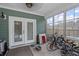Screened porch with French doors and storage space at 316 Bay Village Ln, Moncks Corner, SC 29461