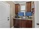 Home office with built-in cabinetry and space for two monitors at 316 Bay Village Ln, Moncks Corner, SC 29461