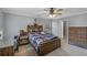 Bedroom with rustic wood furniture and access to bathroom at 316 Bay Village Ln, Moncks Corner, SC 29461