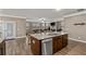 Open kitchen with large island, stainless steel appliances, and granite countertops at 316 Bay Village Ln, Moncks Corner, SC 29461