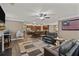 Open concept living room with kitchen views and a cozy sitting area at 316 Bay Village Ln, Moncks Corner, SC 29461