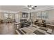 Spacious living area showcasing a large American flag and comfortable seating at 316 Bay Village Ln, Moncks Corner, SC 29461