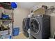 Laundry room with washer, dryer, and ample storage at 316 Bay Village Ln, Moncks Corner, SC 29461