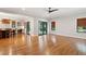 Open living space with hardwood floors, access to kitchen and backyard at 1056 Wharf Indigo Pl, Mount Pleasant, SC 29464