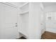 Convenient laundry area with built-in bench and shelving at 425 Grove End Rd, Moncks Corner, SC 29461