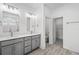 Elegant bathroom with double vanity, large mirror, and a walk-in shower at 425 Grove End Rd, Moncks Corner, SC 29461