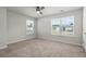 Well-lit bedroom with neutral walls and carpet flooring at 113 Petrell Road, Summerville, SC 29483