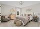 Charming bedroom with a cozy bed, dresser, and comfortable armchair at 416 Grove End Rd, Moncks Corner, SC 29461