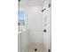 Spacious shower with white subway tile and glass enclosure at 416 Grove End Rd, Moncks Corner, SC 29461