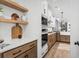 Modern kitchen boasts stainless steel appliances and light wood cabinets at 416 Grove End Rd, Moncks Corner, SC 29461