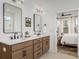 Bathroom boasts double vanity with quartz countertop and modern fixtures at 416 Grove End Rd, Moncks Corner, SC 29461