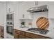 Modern kitchen with stainless steel appliances and white shaker cabinets at 416 Grove End Rd, Moncks Corner, SC 29461
