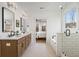 Spa-like bathroom with double vanity, soaking tub, and walk-in shower at 416 Grove End Rd, Moncks Corner, SC 29461