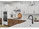 Kitchen features stainless steel appliances, white cabinets, and a gas cooktop at 416 Grove End Rd, Moncks Corner, SC 29461