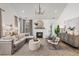 Spacious living room features a comfortable sectional sofa and a fireplace at 416 Grove End Rd, Moncks Corner, SC 29461