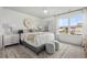 Charming bedroom with a queen-size bed and large windows at 416 Grove End Rd, Moncks Corner, SC 29461