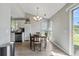 Dining area with a wood table and access to backyard at 127 Alcester Rd, Goose Creek, SC 29445