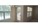 Bright dining area with large windows and patio access at 258 Kelsey Blvd, Wando, SC 29492