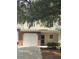 Brick front of townhome with attached garage at 258 Kelsey Blvd, Wando, SC 29492