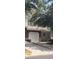 Brick front townhouse with a white garage door and landscaping at 258 Kelsey Blvd, Wando, SC 29492