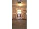 Unfinished garage with door to kitchen and built-in shelving at 258 Kelsey Blvd, Wando, SC 29492