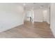 Spacious bonus room with hardwood floors and access to upper hallway at 1663 Cultivation Ln # 455, Mount Pleasant, SC 29466