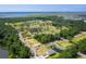 Aerial view of a new neighborhood with waterfront access and lush green spaces at 1663 Cultivation Ln # 455, Mount Pleasant, SC 29466