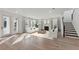 Bright and airy living room with hardwood floors and a fireplace at 1663 Cultivation Ln # 455, Mount Pleasant, SC 29466
