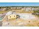 Aerial view of coastal community with new home and pool under construction at 1663 Cultivation Ln # 455, Mount Pleasant, SC 29466