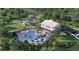 Community pool with clubhouse, landscaping, and plenty of seating at 1663 Cultivation Ln # 455, Mount Pleasant, SC 29466