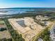 Aerial view of new construction homes and undeveloped land at 1663 Cultivation Ln # 455, Mount Pleasant, SC 29466