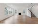 Spacious living room with hardwood floors and fireplace at 1663 Cultivation Ln # 455, Mount Pleasant, SC 29466