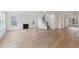 Spacious living room with hardwood floors and a fireplace at 1663 Cultivation Ln # 455, Mount Pleasant, SC 29466