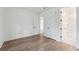 Bedroom with hardwood floors and access to bathroom at 1663 Cultivation Ln # 455, Mount Pleasant, SC 29466