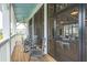 Screened porch with rocking chairs and access to community at 1668 Siloh Dr # 470, Mount Pleasant, SC 29466