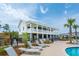 Community pool with cabana, lounge chairs, and a playground nearby at 1668 Siloh Dr # 470, Mount Pleasant, SC 29466