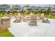 Community fire pit with seating area and brick accents at 1668 Siloh Dr # 470, Mount Pleasant, SC 29466