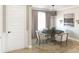 Formal dining room with round table and neutral decor at 1668 Siloh Dr # 470, Mount Pleasant, SC 29466
