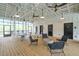 Community room with multiple seating areas and high ceilings at 1668 Siloh Dr # 470, Mount Pleasant, SC 29466