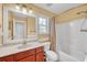 Clean bathroom with single vanity, tub shower combo and window at 2851 Curran Pl, Mount Pleasant, SC 29466