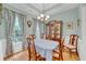 Formal dining room with hardwood floors, light-blue walls and antique furniture at 2851 Curran Pl, Mount Pleasant, SC 29466