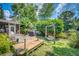 Wooden deck with seating, grill, and garden swing at 2851 Curran Pl, Mount Pleasant, SC 29466